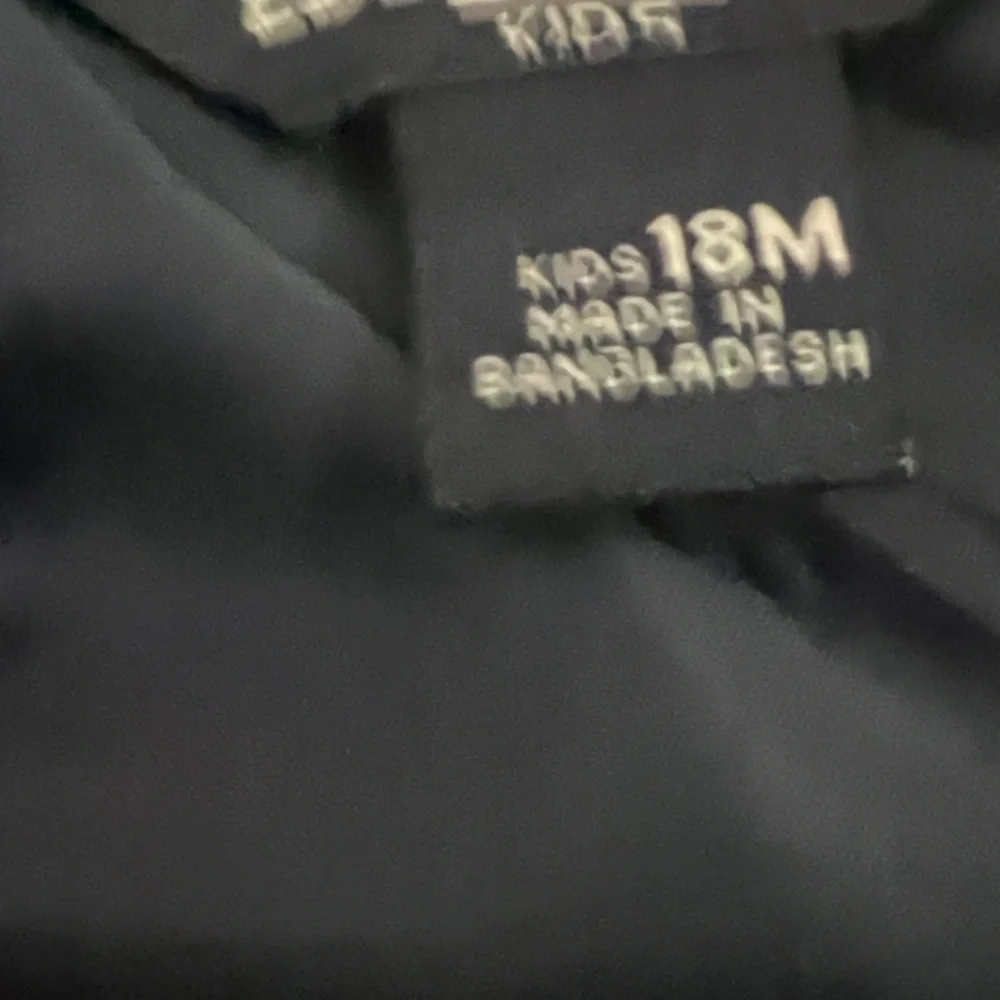 Lands' End Kids Navy, White & Olive Puffer Vest with Yellow Zipper - Picture 3 of 5